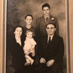 Remy (standing, in tie) with parents John and Rose, siblings Peter & Joyce